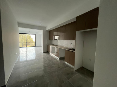 GİRNE/ÇATALKÖY'DE ANA CADDE ÜZERİ SATILIK 1+1/2+1 SIFIR DAİRELER-3