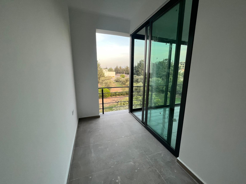 GİRNE/ÇATALKÖY'DE ANA CADDE ÜZERİ SATILIK 1+1/2+1 SIFIR DAİRELER-14