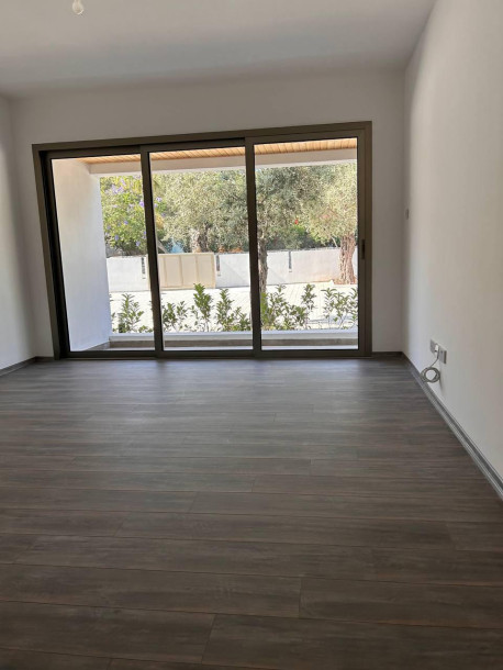 GİRNE/ALSANCAK'TA HAVUZLU SİTE İÇERİSİNDE SATILIK SIFIR 2+1 DAİRE-1
