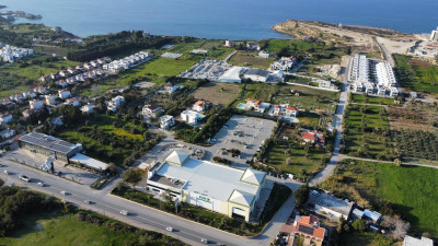 GİRNE/ÇATALKÖY ŞAH MARKET BÖLGESİNDE SATILIK ARSA – DENİZE YÜRÜME MESAFESİNDE