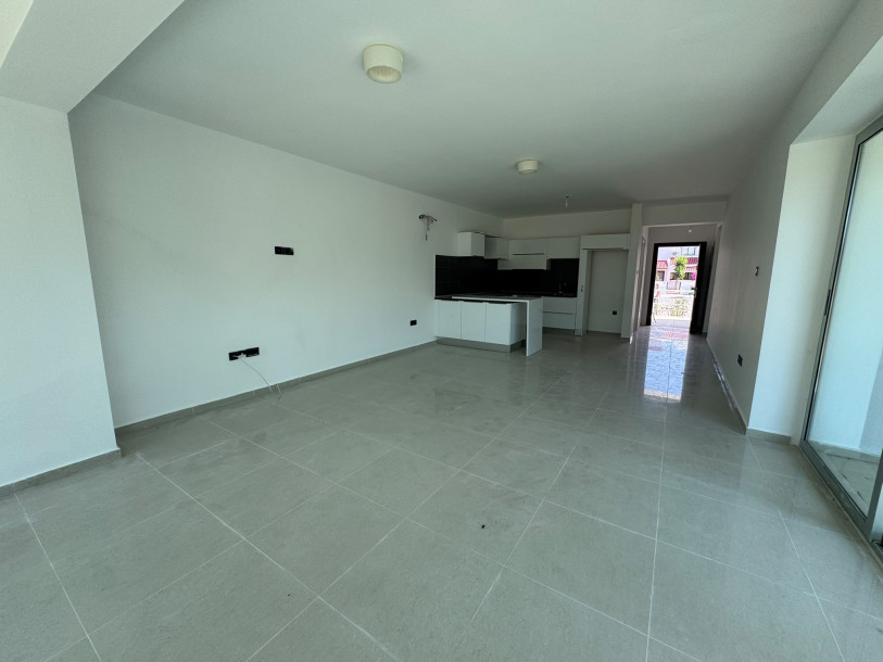 GİRNE DOĞANKÖY’DE EŞDEĞER TAPULU 3+1 SATILIK BAHÇE KATı DAİRE-2