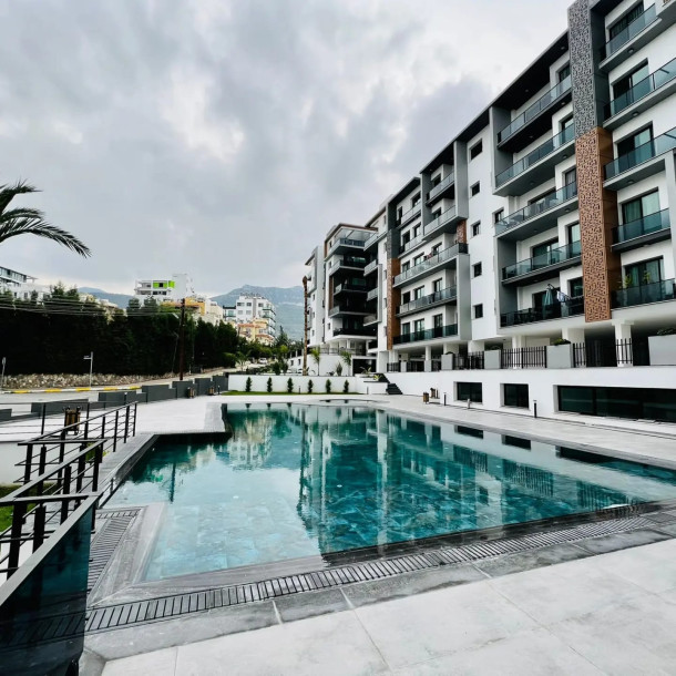 GİRNE MERKEZ – AVANGART SİTESİ SATILIK 1+1 TİCARİ İZİNLİ DAİRE-1