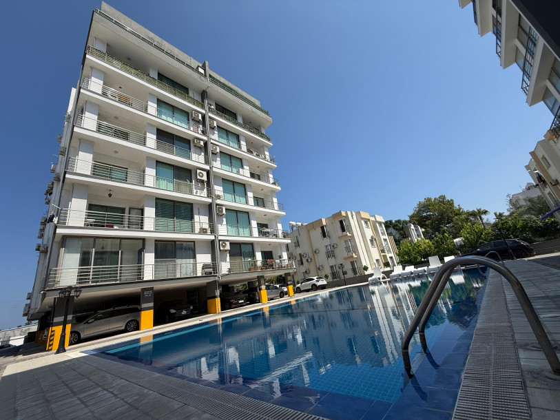 GİRNE MERKEZ ÖĞRETMENLER EVİ BÖLGESİNDE HAVUZLU SİTEDE KİRALIK 2+1 EŞYALI DAİRE-1