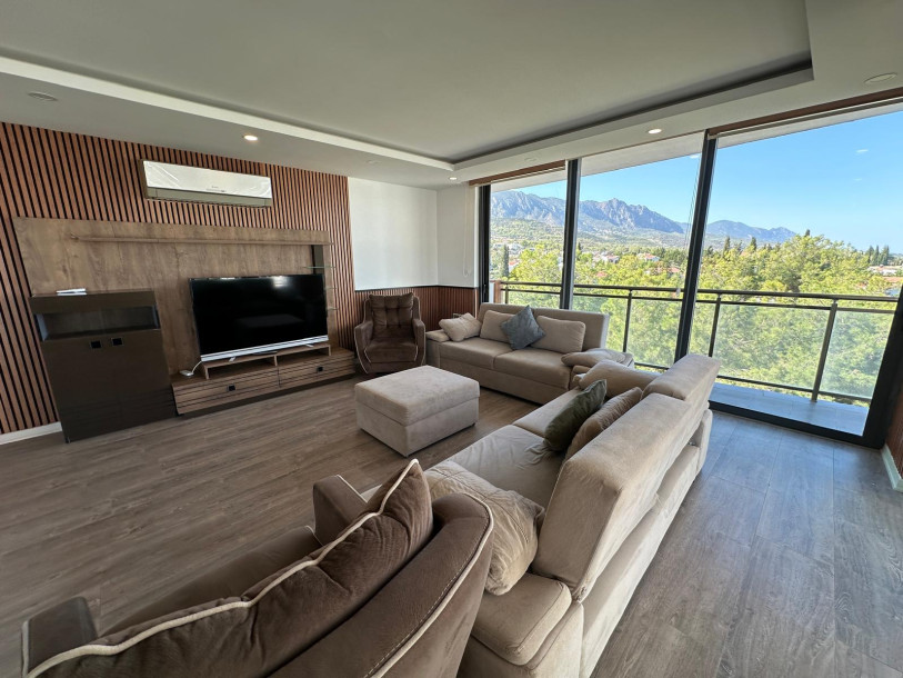 GİRNE AKACAN SİTESİNDE SATILIK DENİZ VE DAĞ MANZARALI 4+1 EŞYALI DAİRE-1