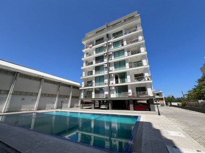 GİRNE MERKEZ ÖĞRETMENLER EVİ BÖLGESİNDE HAVUZLU SİTEDE KİRALIK 2+1 EŞYALI DAİRE